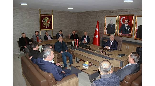 Başkan Uysal&#39;dan MHP ilçe teşkilatına nezaket ziyareti