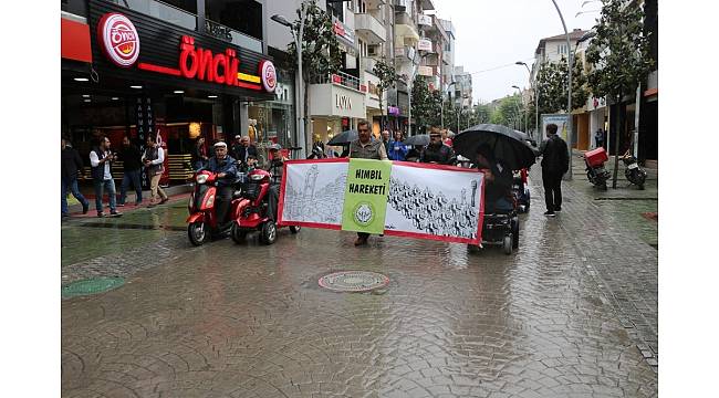 Yağmura rağmen engellilere dikkat etmek için yürüdüler